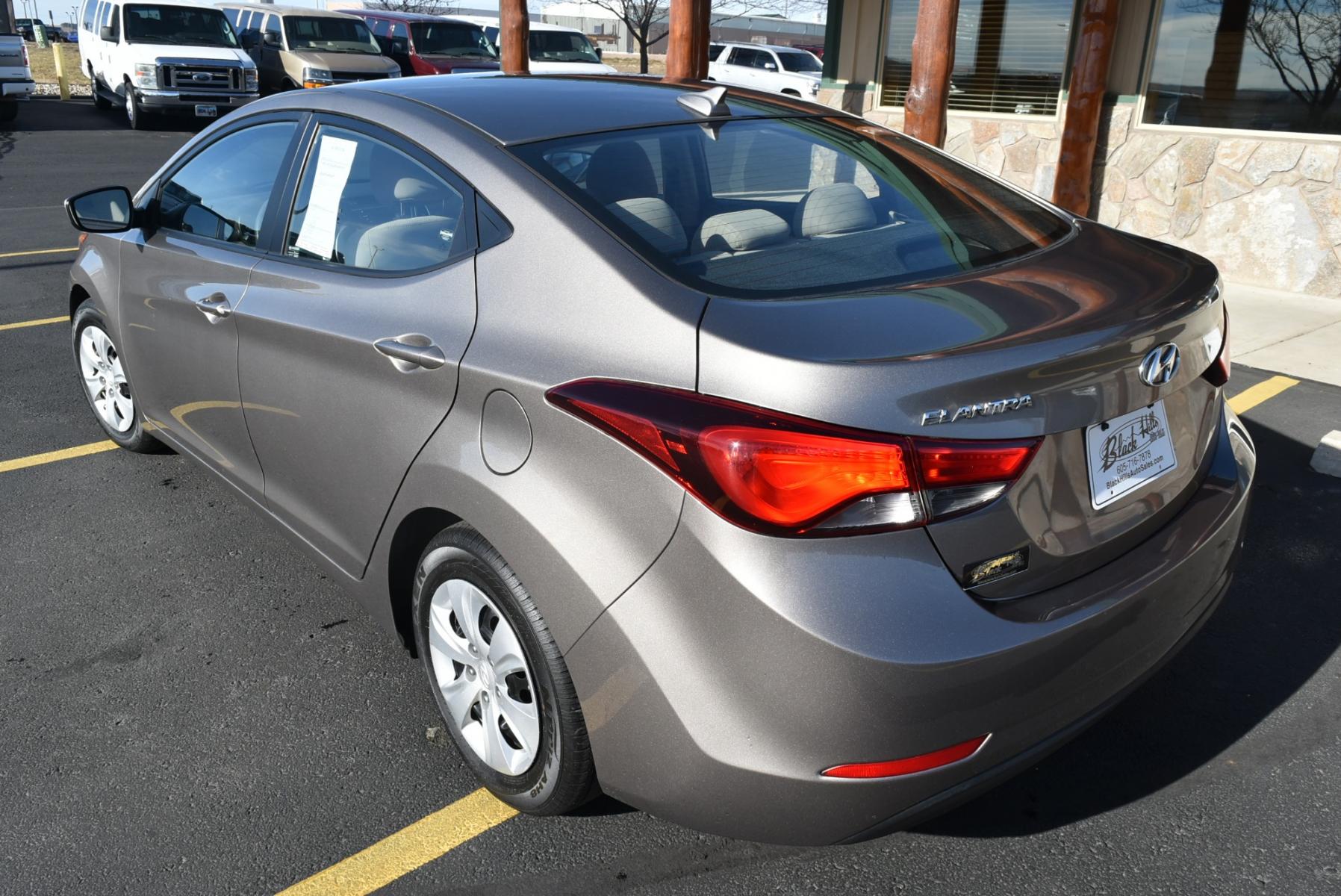 2016 Bronze Hyundai Elantra SE (5NPDH4AE3GH) with an 1.8L 4 Cyl engine, 6-Speed Automatic transmission, located at 1600 E Hwy 44, Rapid City, SD, 57703, (605) 716-7878, 44.070232, -103.171410 - Photo #5